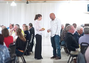 Amanda J. Hamilton of Konicek & Dillon and Kane County Circuit Judge F. Keith Brown have a chat among the crowd during the Kane County Bar Foundation's 55th annual Steer Roast at the Batavia VFW. 