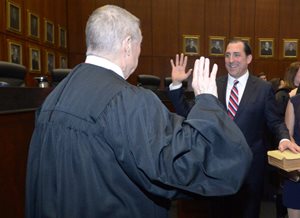 Judge Michael S. Kanne of the 7th U.S. Circuit Court of Appeals administered the oath of office to U.S. Attorney John R. Lausch Jr., his former law clerk, during his investiture at the Dirksen Federal Courthouse on Feb. 1. 