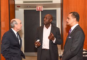 Former Chicago Bear Desmond Clark (center) visited The Chicago Bar Association on Oct. 12 as part of the CBA’s speakers series. Clark, now an author and motivational speaker, discussed personal challenges and obstacles he overcame to have a successful NFL career. Pictured with Clark are CBA Executive Director Terry Murphy (left) and CBA Treasurer Maurice Grant of Grant Law. 