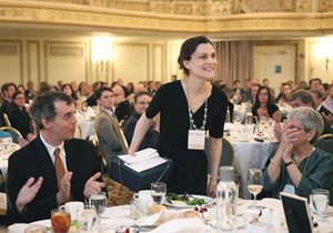 Miriam V. Hallbauer, a senior attorney at the Legal Assistance Foundation (LAF), gets a round of applause after receiving the Jerold S. Solovy Equal Justice Award at the LAF annual luncheon at the Palmer House. 