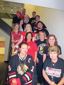 Segal McCambridge Singer & Mahoney attorneys and staff celebrated the start of the Stanley Cup playoffs by wearing Chicago Blackhawks gear to the office.