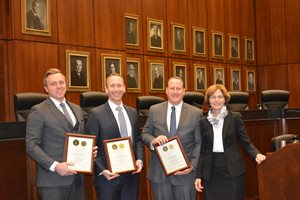 The U.S. District Court for the Northern District of Illinois honored Greenberg Traurig associates (from left) Kyle L. Flynn and Ian D. Burkow and shareholder Charles B. Leuin with its Excellence in Pro Bono Service Award on May 1 at the Dirksen Federal Courthouse for their work on behalf of a client who brought a racial discrimination suit against his employer and former supervisors. They’re pictured with District Judge Rebecca R. Pallmeyer.