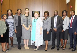 A group of dignitaries from Zambia visited the Circuit Court of Cook County on June 22 and June 23. As part of their visit, they learned more about domestic relations matters in the Richard J. Daley Center, as the High Court of Zambia has removed family law matters from its general civil court to a less-adversarial Family and Children’s Court. Pictured are (left to right) Lois Chisompola, Assistant Senior Research Advocate; Nalishebo Imataa, Chief Administrator; Koreen Etambuyu Mwenda Zimba, Registrar Commercial Court; Justice Nicola Ann Sharpe-Phiri, High Court Judge; Presiding Judge Grace G. Dickler of the Domestic Relations Division; Justice Anessie Michael Banda-Bobo, High Court Judge; Evaristo Pengele, Registrar Supreme Court; Twaambo Shalwindi, Registrar Family Division; and Lekeshya Kaunda, Protocol Officer. 