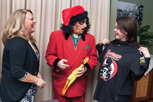 Alia Caravelli (left) and Deanna Blair ham it up with “Sventa Claus,” aka Rich Koz, a multiple Emmy award winner for his TV show “Svengoolie,” at the DuPage County chapter of the Justinian Society of Lawyers holiday party. Koz was the featured guest at the party where the group presented a $21,000 check to Ronald McDonald House Charities. Caravelli and Blair are founding members at Blair Caravelli Irmen Law. 

