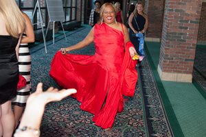 Cook County Associate Judge Patrice Ball-Reed stuns in red as she makes her entrance Friday at the Women’s Bar Association of Illinois’ 100th anniversary gala in the grand ballroom at Navy Pier.