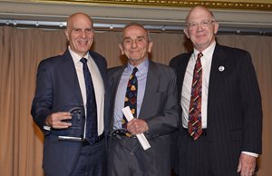 The Bulletin of the Atomic Scientists honored Reed Smith partners Lowell Sachnoff ( center) and Austin Hirsch for their pro bono efforts at its annual dinner Nov. 7 at the Palmer House Hilton. The partners are board members for the nonprofit organization that publishes information about man-made threats and are pictured with the Bulletin’s Board Chairman John Balkcom.
