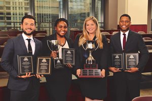 Loyola University Chicago School of Law’s Corboy fellows in trial advocacy won the 2019 Tournament of Champions sponsored by the National Board of Trial Advocacy Oct. 23 in Washington, D.C. Teammates  (left to right) Brian Baloun, Miya Saint-Louis, Madeline Beck and Joseph Tennial competed against 15 other law schools in six rounds as student advocates and witnesses. Baloun and Saint-Louis tied for the board’s Best Advocate Award, the first time in tournament history the title has been shared by two advocates from one team.