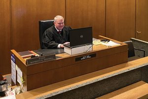 Cook County Circuit Judge Raymond W. Mitchell prepares for a trial by webcam on June 10, believed to be the first civil trial in Cook County held virtually.