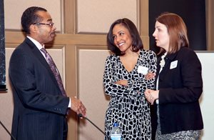 Cook County Associate Judge Franklin Valderrama chats with Jennifer Ballard of Hinshaw & Culbertson (left) and Julia Williams of Williams Law after the panel discussion, “A View From Behind the Bench,” at the Women’s Bar Association of Illinois’Women in the Law Symposium. 